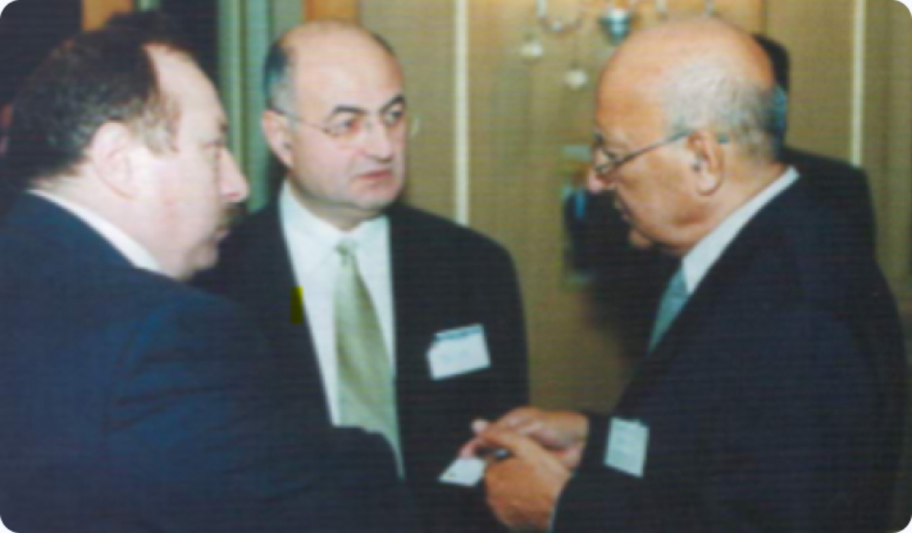 Members around a table at a policy session